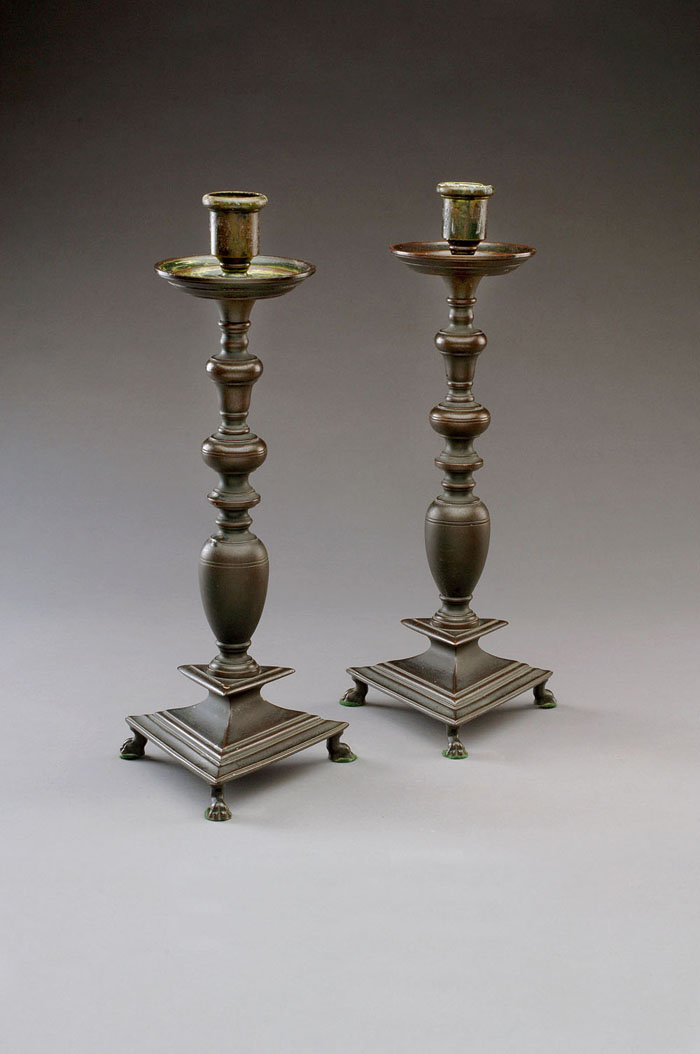 Appraisal: PAIR OF CONTINENTAL BAROQUE STYLE BRONZE CANDLESTICKS Each knopped baluster