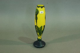 Appraisal: A French bulbous yellow ground art glass vase with Arum