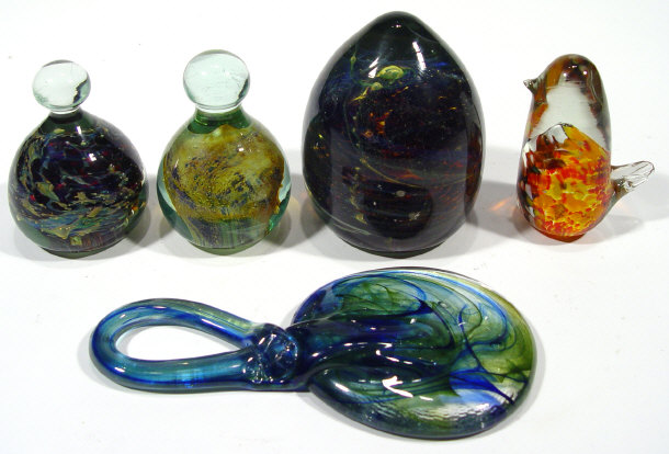 Appraisal: Four Medina glass paperweights and a hanging weight with blue