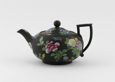 Appraisal: A Wedgwood Black Basalt teapot and cover the flattened globular