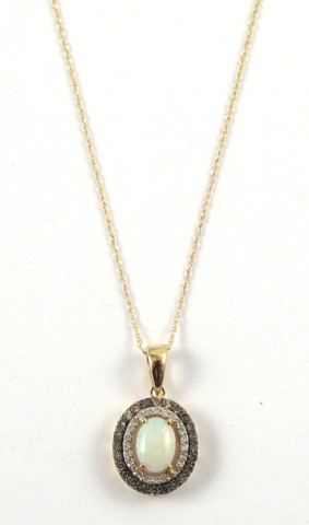 Appraisal: OPAL AND DIAMOND PENDANT NECKLACE the pendant suspended on a