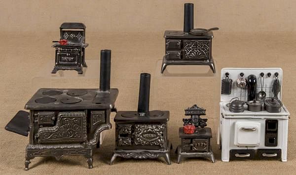 Appraisal: Six cast iron toy stoves to include a Grey Iron