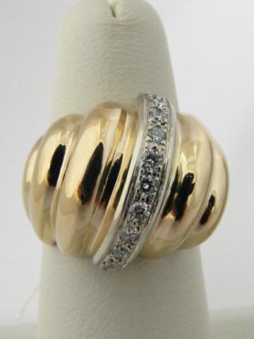 Appraisal: K yellow gold ribbed dome ring with ctw of diamonds