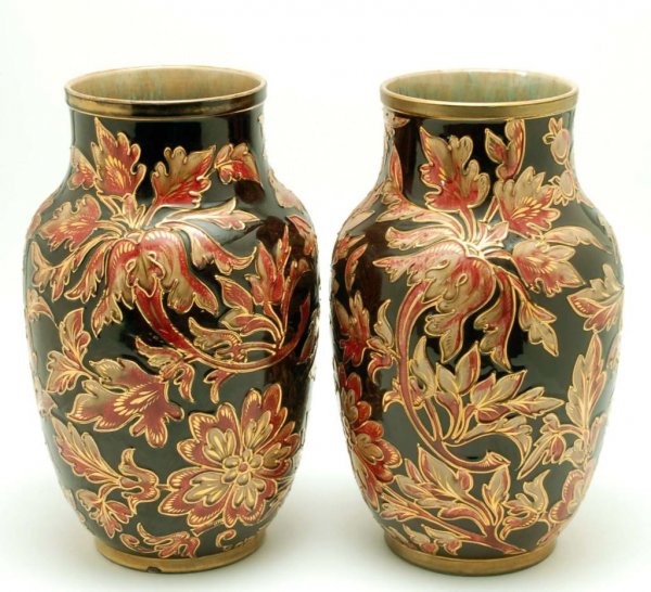 Appraisal: Pair of Luneville table vases Molded flare mouth with a