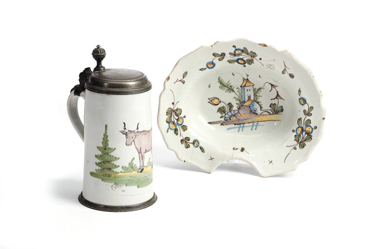 Appraisal: GERMAN FAIENCE POLYCHROME PEWTER-MOUNTED TANKARD Painted with a manganese steer