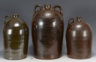 Appraisal: Southern stoneware jugs prob GA Grouping of Southern stoneware jugs