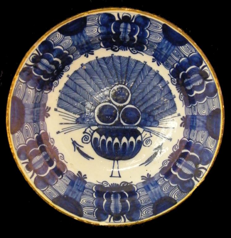 Appraisal: Early blue and white Delft charger loosely painted with stylistic