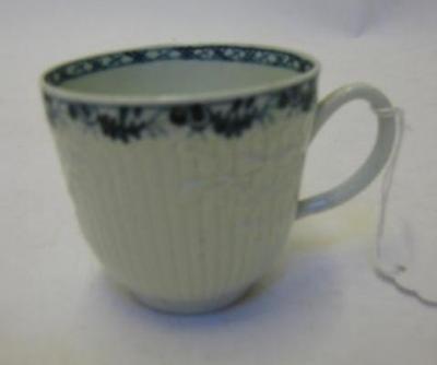 Appraisal: A CHRISTIAN'S LIVERPOOL PORCELAIN COFFEE CUP moulded with flowering branches