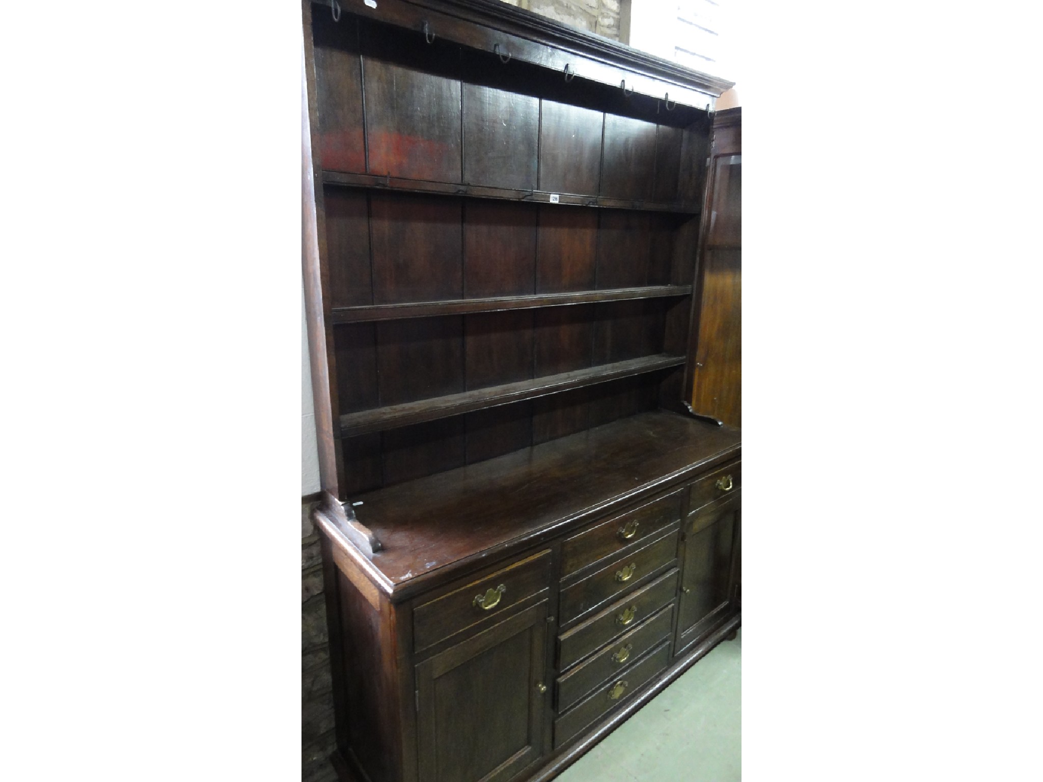 Appraisal: An old English style oak dresser the base fitted with