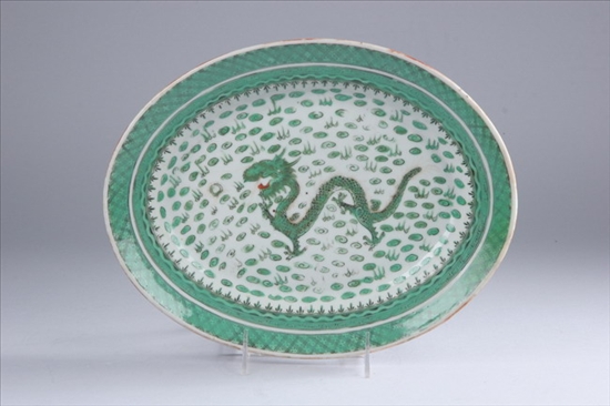 Appraisal: CHINESE GREEN AND WHITE PORCELAIN OVAL PLATTER Qing Dynasty Dragon