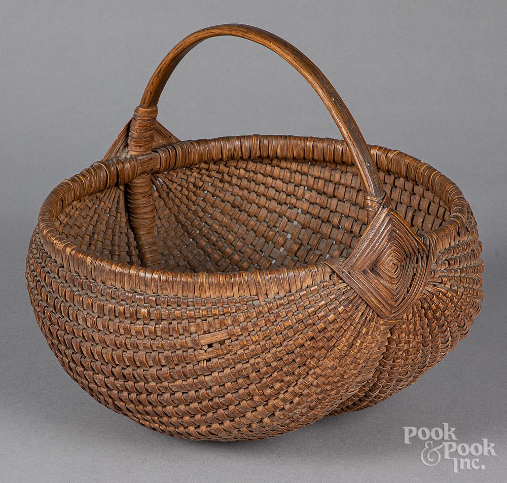 Appraisal: Finely woven Gods eye basket th c Finely woven Gods