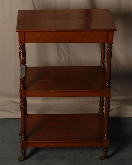 Appraisal: Walnut -shelf Occasional Table single drawer castors turned supports high