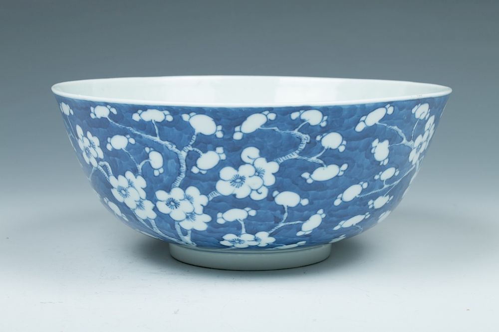 Appraisal: BLUE AND WHITE 'PRUNUS' BOWL The bowl of globular form