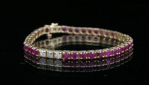 Appraisal: A Ruby Diamond Tennis Bracelet K yellow gold bracelet with