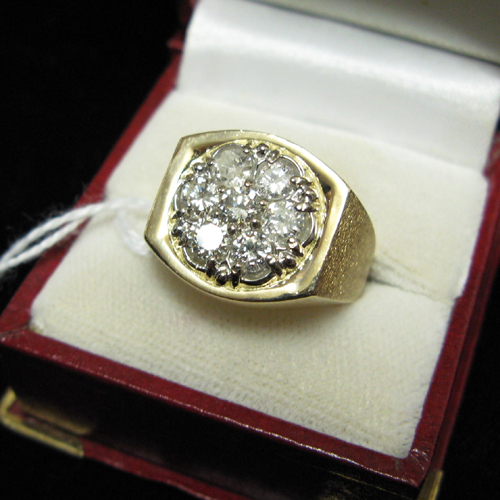 Appraisal: MAN'S DIAMOND AND FOURTEEN KARAT GOLD RING the oval cluster