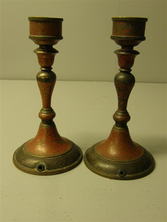 Appraisal: Pair of late th century Indian brass and enamel candlesticks