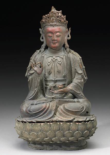 Appraisal: A cast bronze seated Amitayus and lotus stand Ming Dynasty