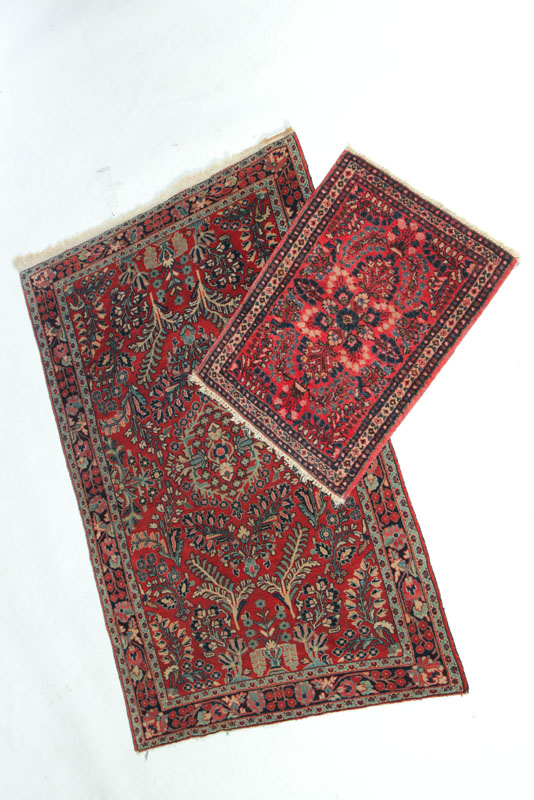 Appraisal: TWO ORIENTAL RUGS Twentieth century Sarouks Floral design in pinks