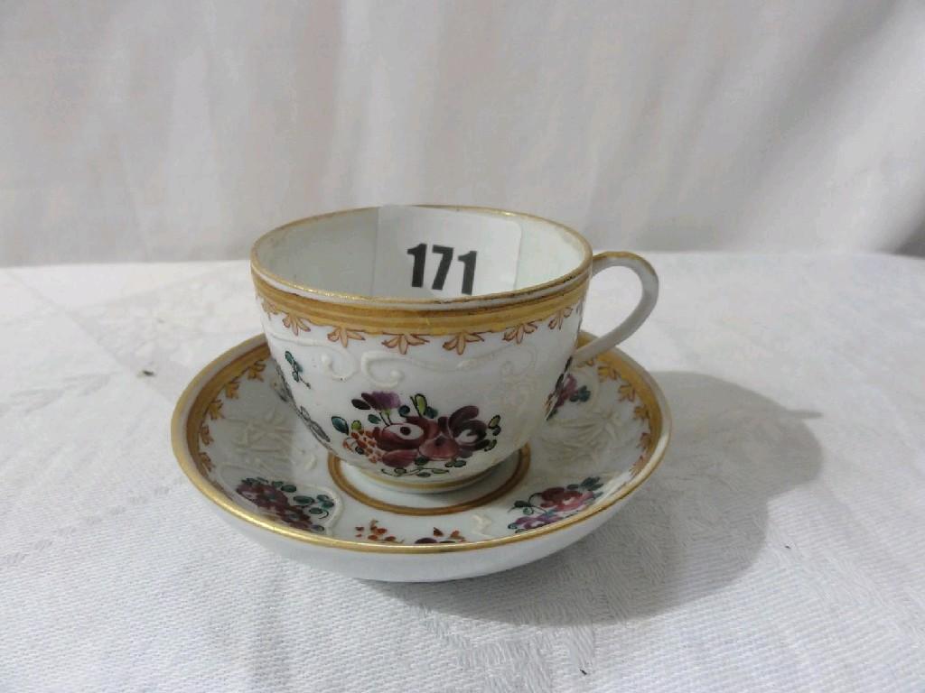 Appraisal: A th century continental cabinet cup and saucer with painted