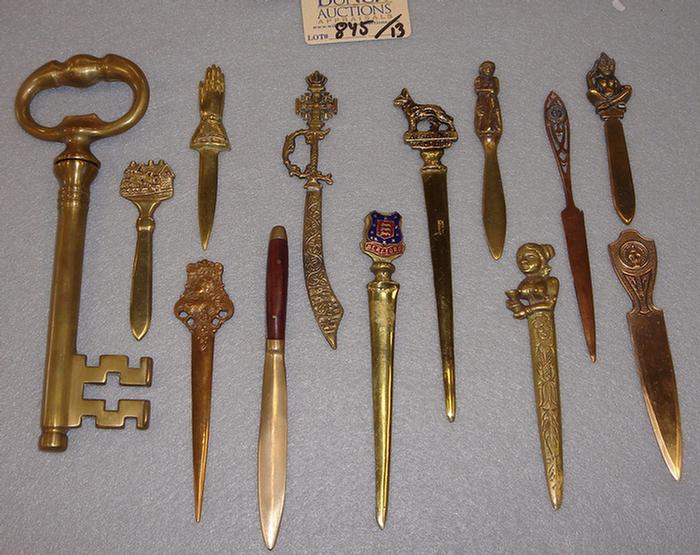 Appraisal: Lot of vintage brass miniature letter openers Including Alsatian wolf