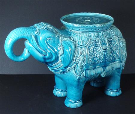 Appraisal: A turquoise glazed elephant plant stand Possibly Burmantofts pottery standing