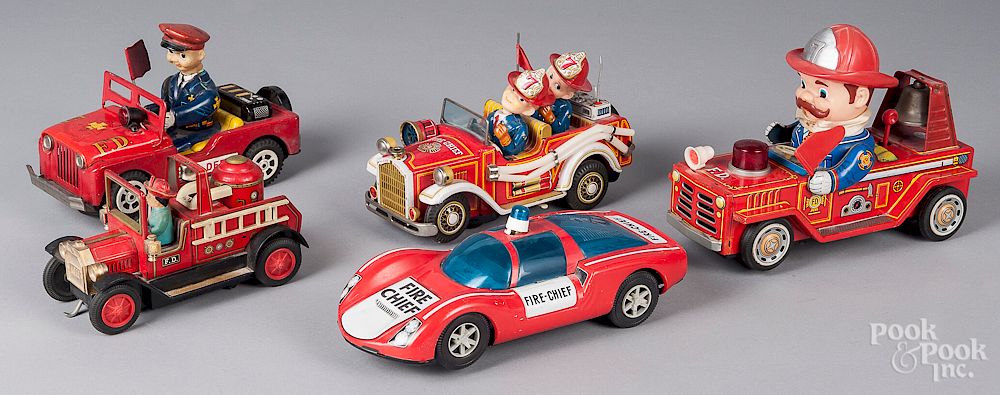 Appraisal: Five tin litho battery operated fire vehicles Five tin litho