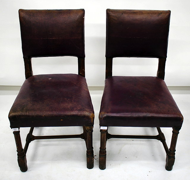 Appraisal: A PAIR OF VICTORIAN PUGEN STYLE PURPLE LEATHER AND OAK