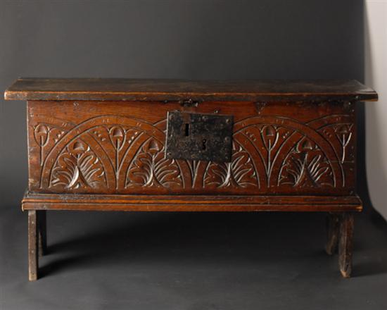 Appraisal: A th C English Oak Coffer with a chip carved