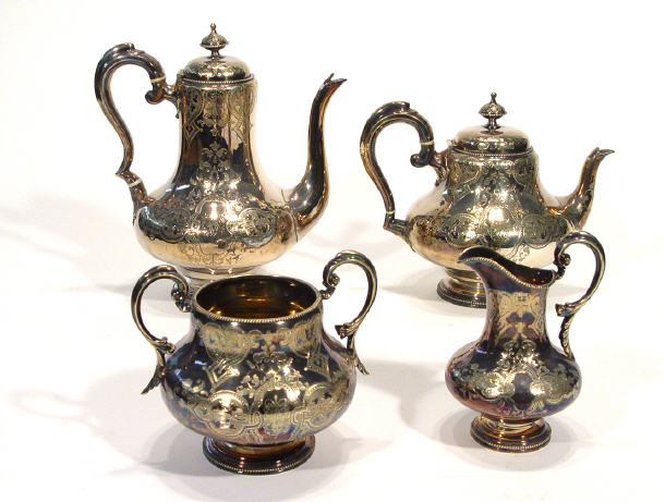 Appraisal: Four piece Victorian silver plated teaset chased with stylised flowers