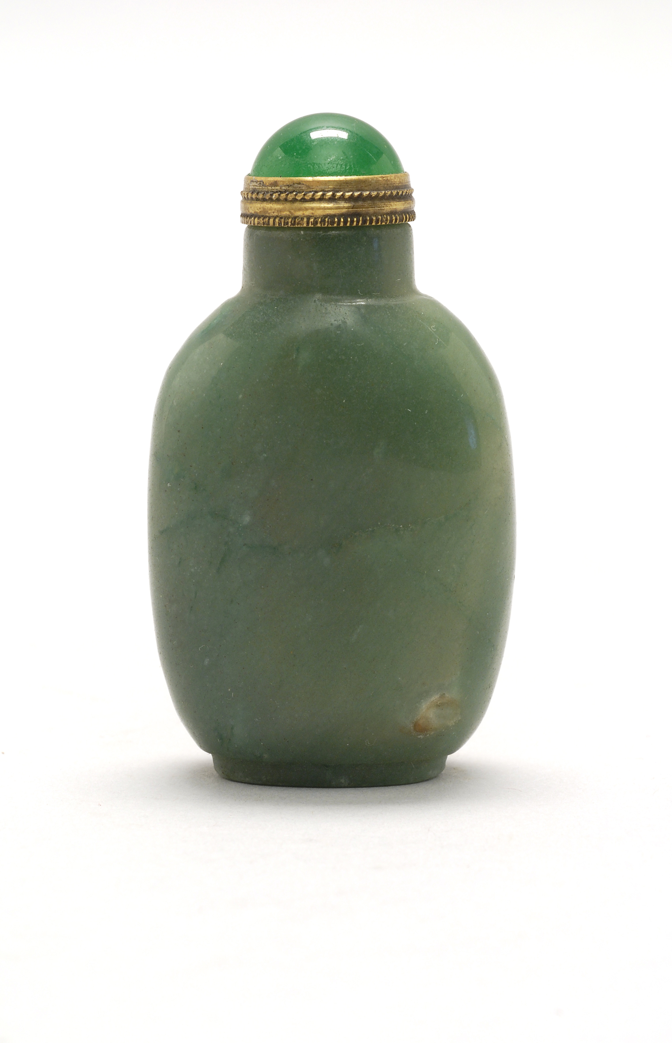 Appraisal: GREEN JADE SNUFF BOTTLE Late th CenturyIn elongated ovoid form