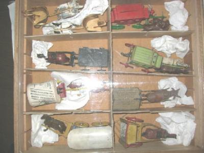 Appraisal: Nine unboxed horse drawn items comprising two stage coaches two