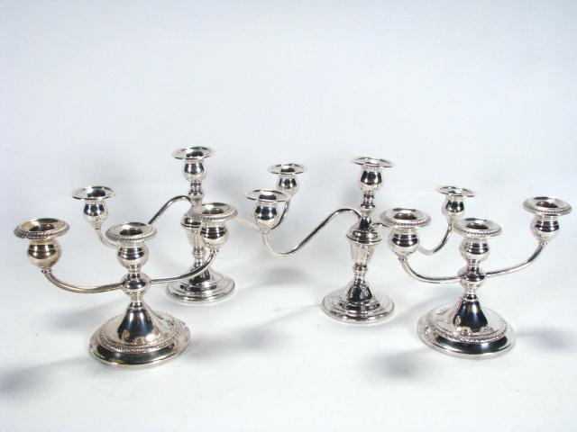 Appraisal: Two pair of sterling silver weighted candle holders one pair