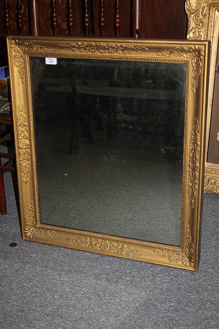 Appraisal: A FRENCH EMPIRE GILT FRAME WALL MIRROR cm x cm