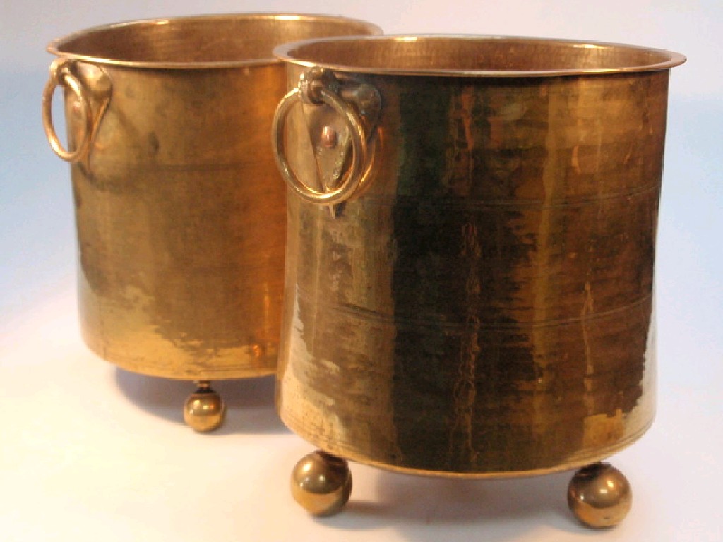 Appraisal: A pair of Burmese rice cooking pots with ring handles