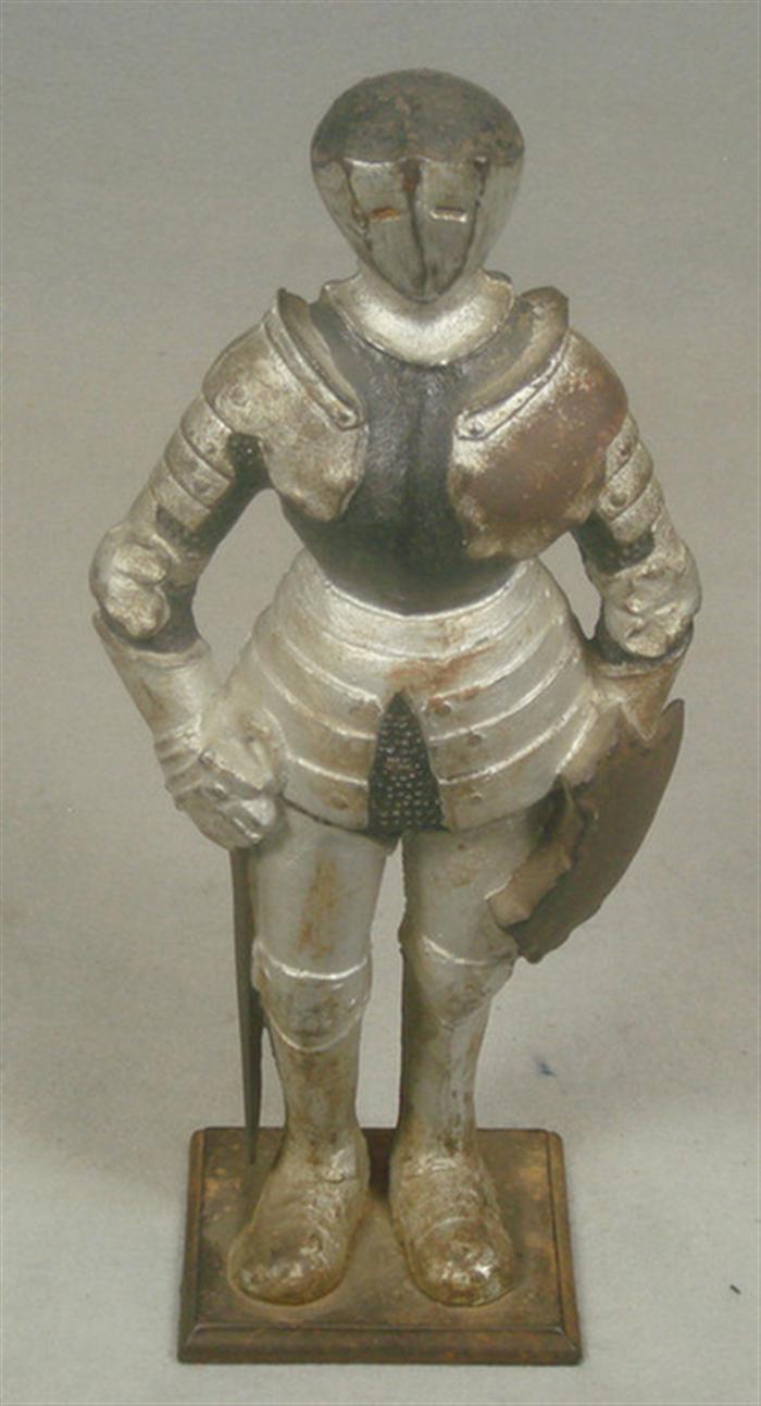 Appraisal: Cast iron doorstop large knight in shining armor on rusted