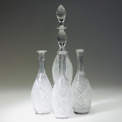 Appraisal: Set of four cut glass decanters two missing stoppers