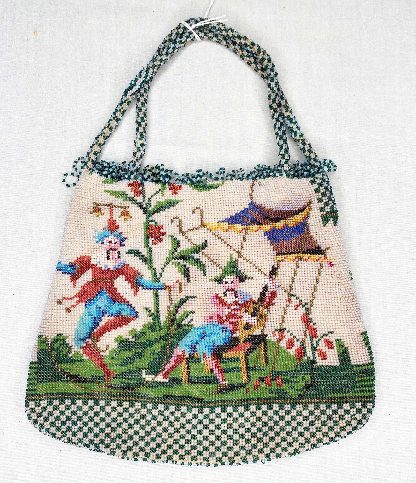 Appraisal: Micro Beaded Hand Bag with Jesters long at widest not