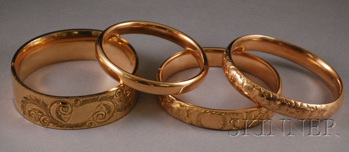 Appraisal: Four Gold-filled Bangles three with engraved design interior circ to