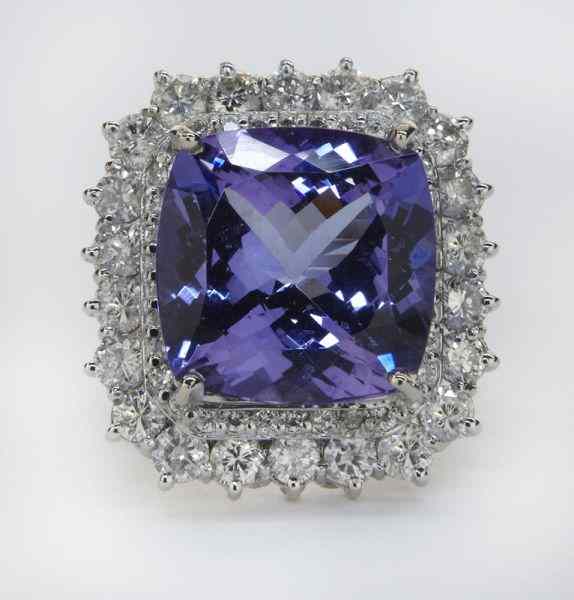 Appraisal: K gold diamond and tanzanite ring the central cushion cut