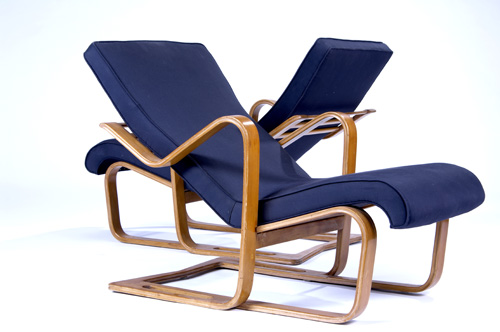 Appraisal: MARCEL BREUER Pair of bentwood lounge chairs upholstered in blue