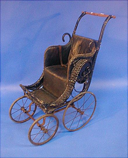 Appraisal: A late Victorian wicker loom child's push chair -