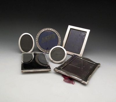 Appraisal: A collection of six silver photograph frames comprising a Victorian