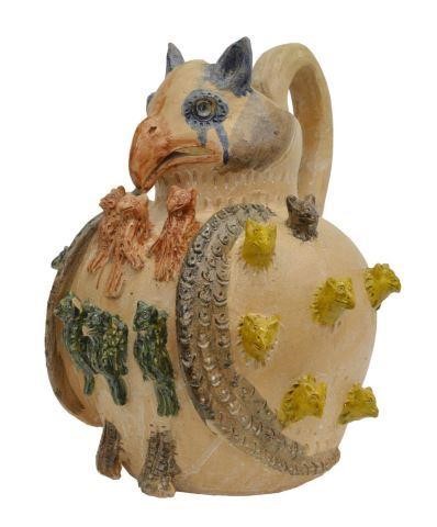 Appraisal: Large earthenware owl-form pitcher with applied birds highlighted in blue