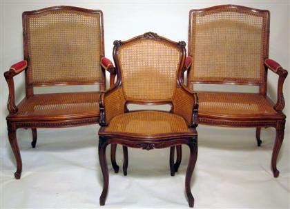 Appraisal: Pair Louis XVI style cane upholstered walnut fauteuils a la