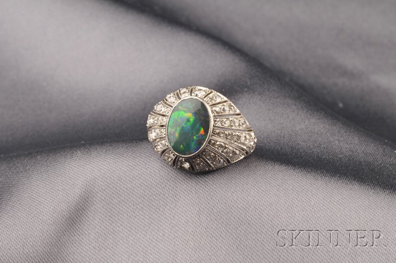 Appraisal: Art Deco Platinum Opal and Diamond Ring bezel-set with a