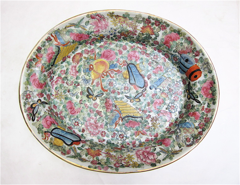 Appraisal: CHINESE ROSE MEDALLION OVAL SERVING DISH with butterflies fruit and