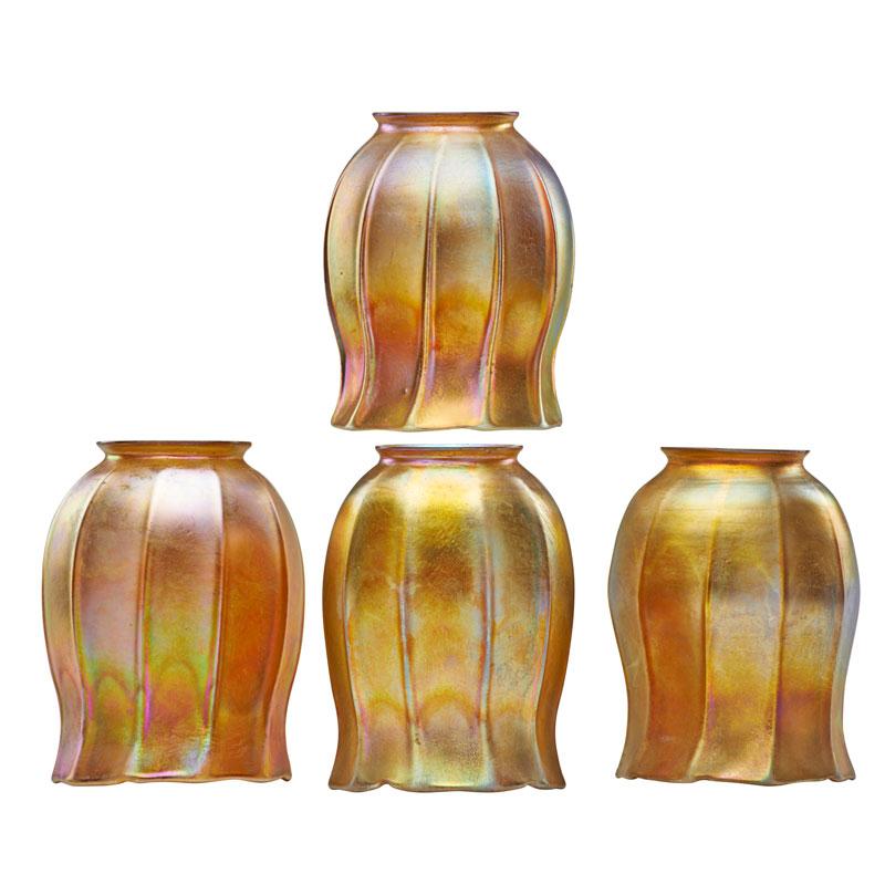 Appraisal: TIFFANY STUDIOS Four gold Favrile glass shades Condition Report Small