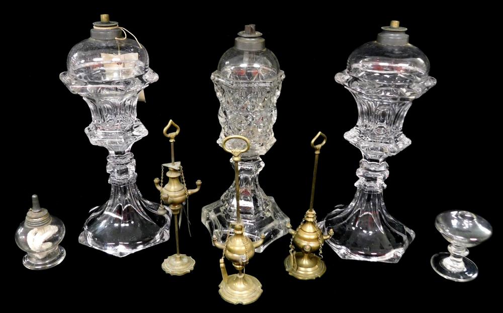 Appraisal: GLASS Eight oil lamps three clear glass whale oil lamps