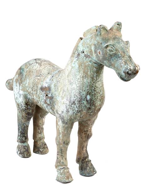 Appraisal: A pair of Han style patinated metal horses height in