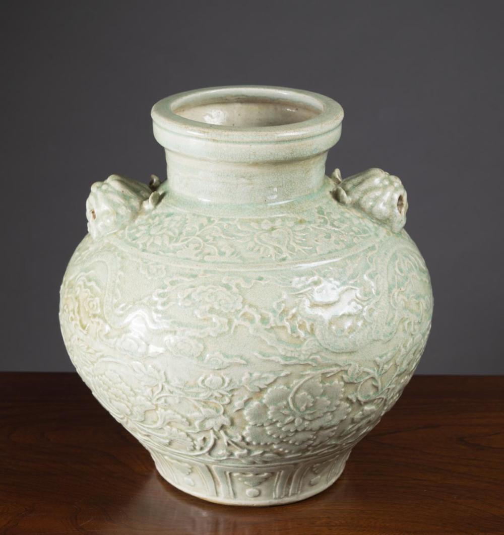 Appraisal: CHINESE CELADON GLAZED POTTERY JAR with high shoulders and tapered